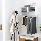 White coat organizer rack with top shelves and hanging rail for coats and bags