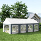 Light grey marquee gazebo with white roof and arched window panels along the side