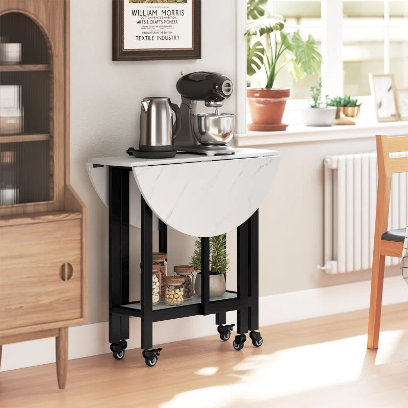 Folding dining table with drop leaf, open shelf, and caster wheels in a white marble finish
