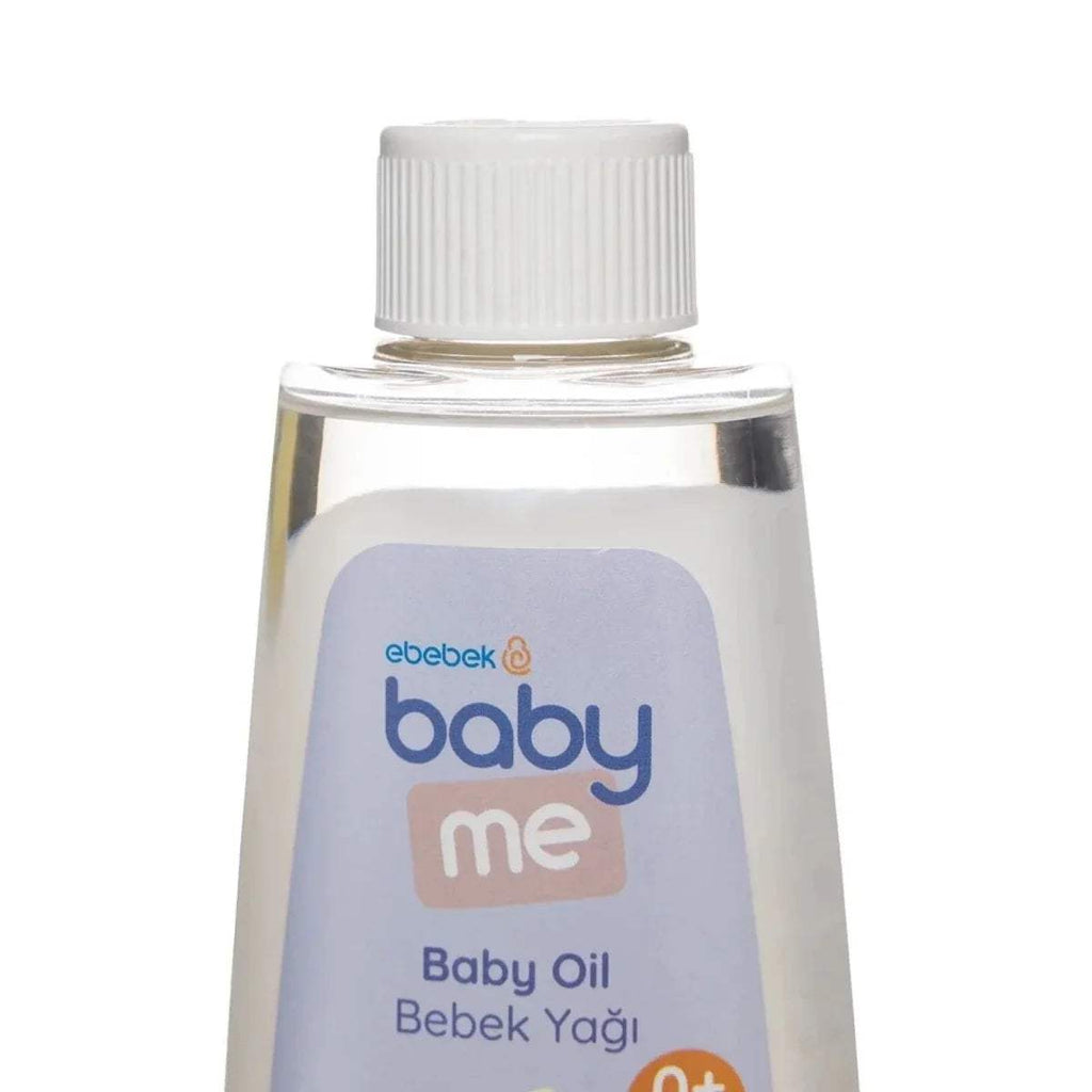 ebebek baby me Baby Oil front label close-up on clear bottle with white cap