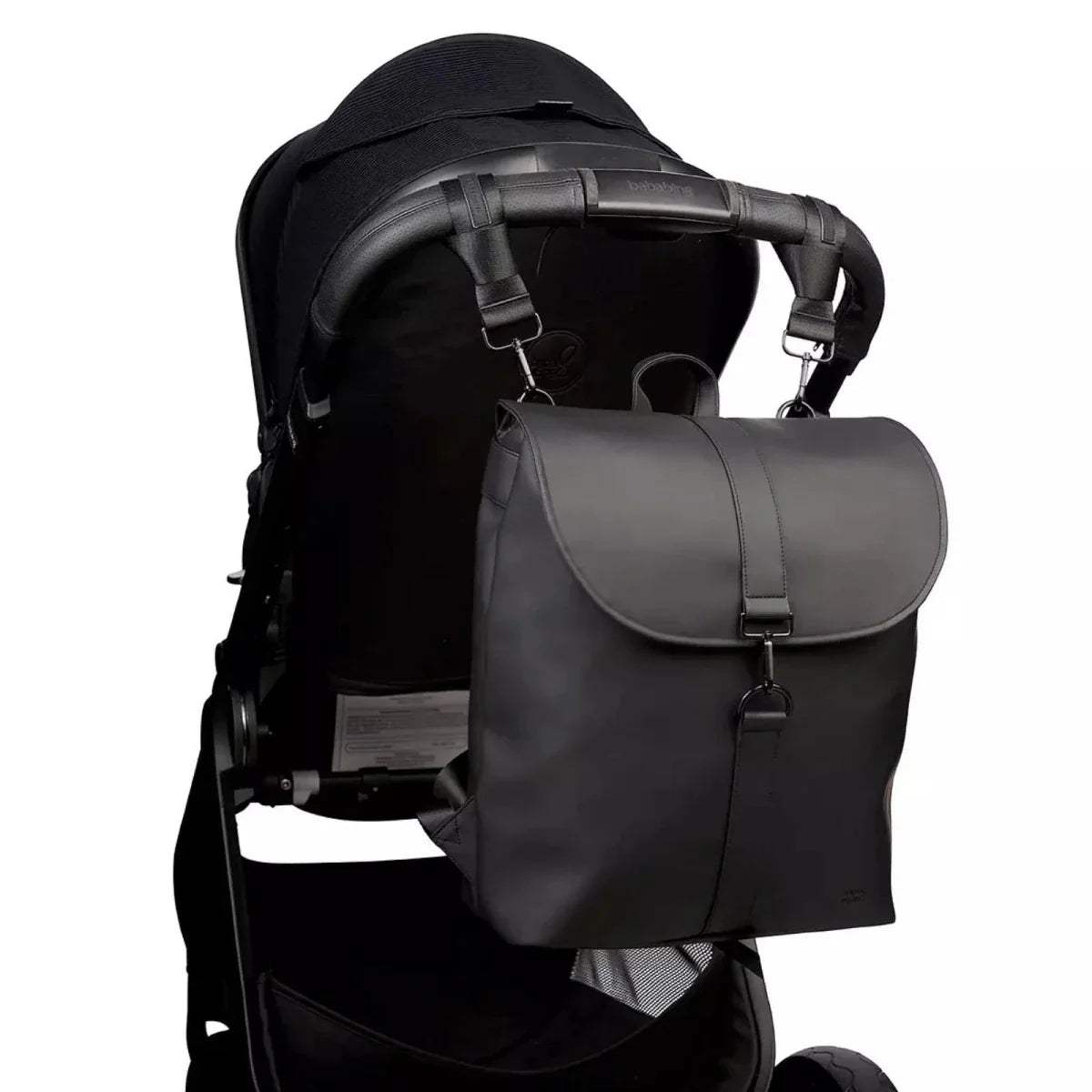 Black changing backpack with front flap, shoulder straps, and stroller attachment straps