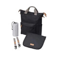 Black changing backpack with front pocket, zip top, and included folding changing mat