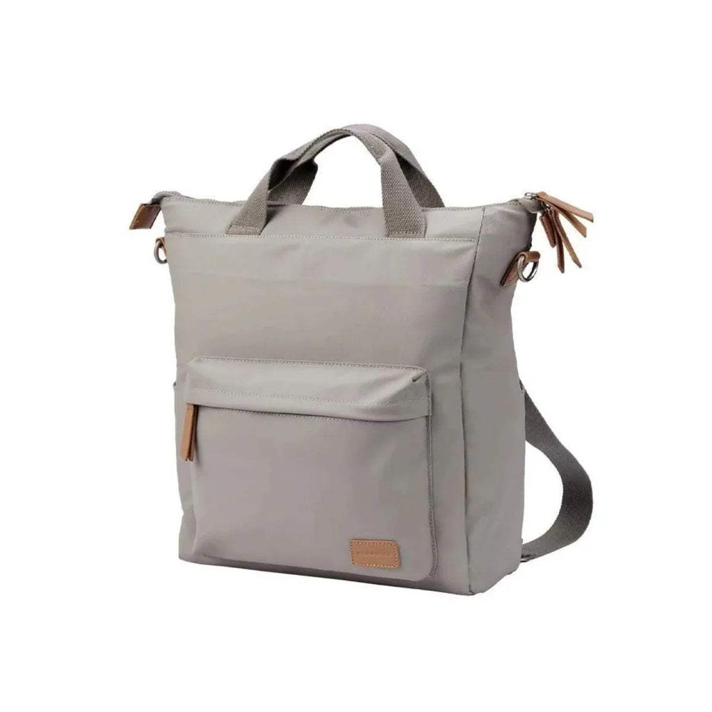 Light beige changing bag with front pocket and adjustable crossbody strap