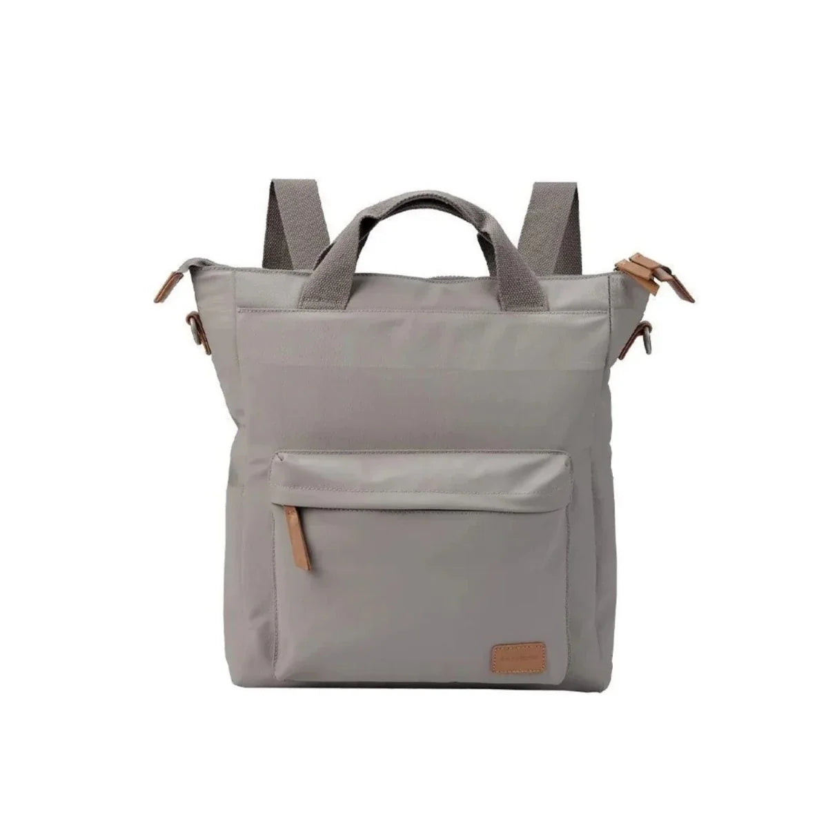 Light beige changing bag with two straps, front pocket, and small leather patch