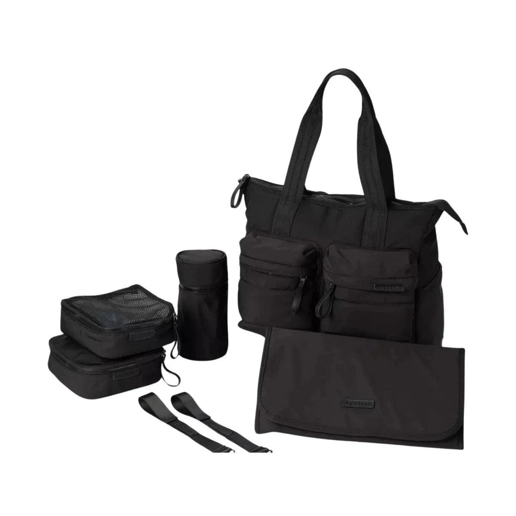 Black changing bag with top handles, front pockets, and adjustable strap
