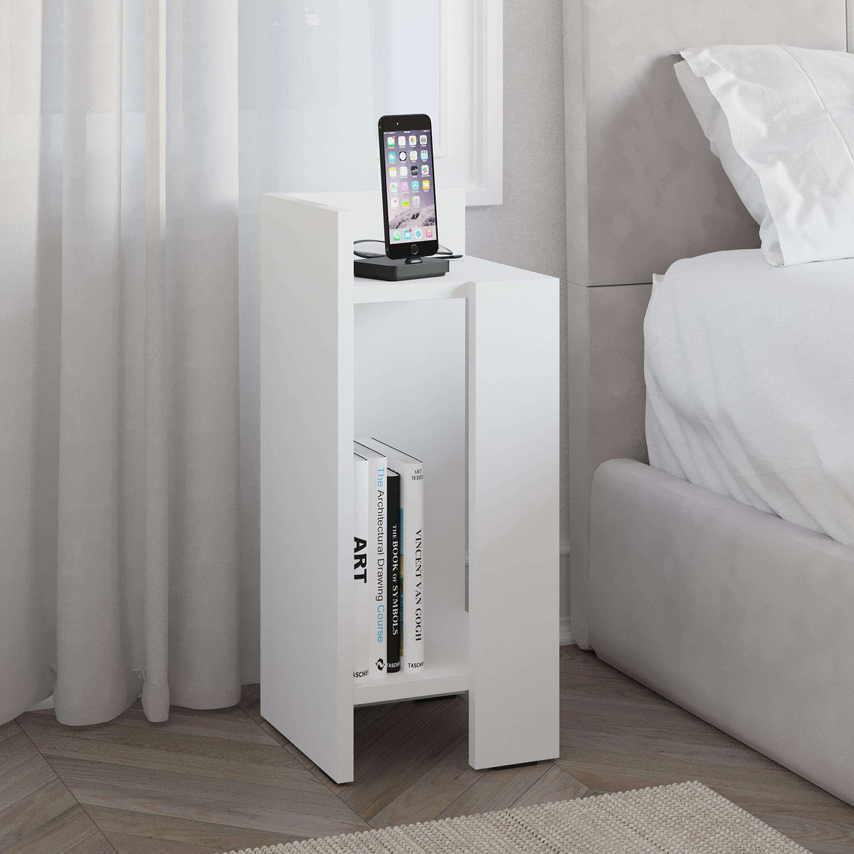 White narrow bedside table module with open shelf and phone dock on top