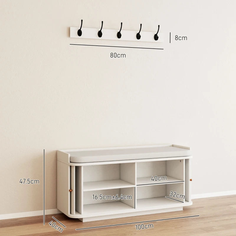 White hallway storage bench with open shelving and wall coat hooks