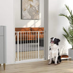 White dog safety gate installed in a doorway, with latch and vertical bars