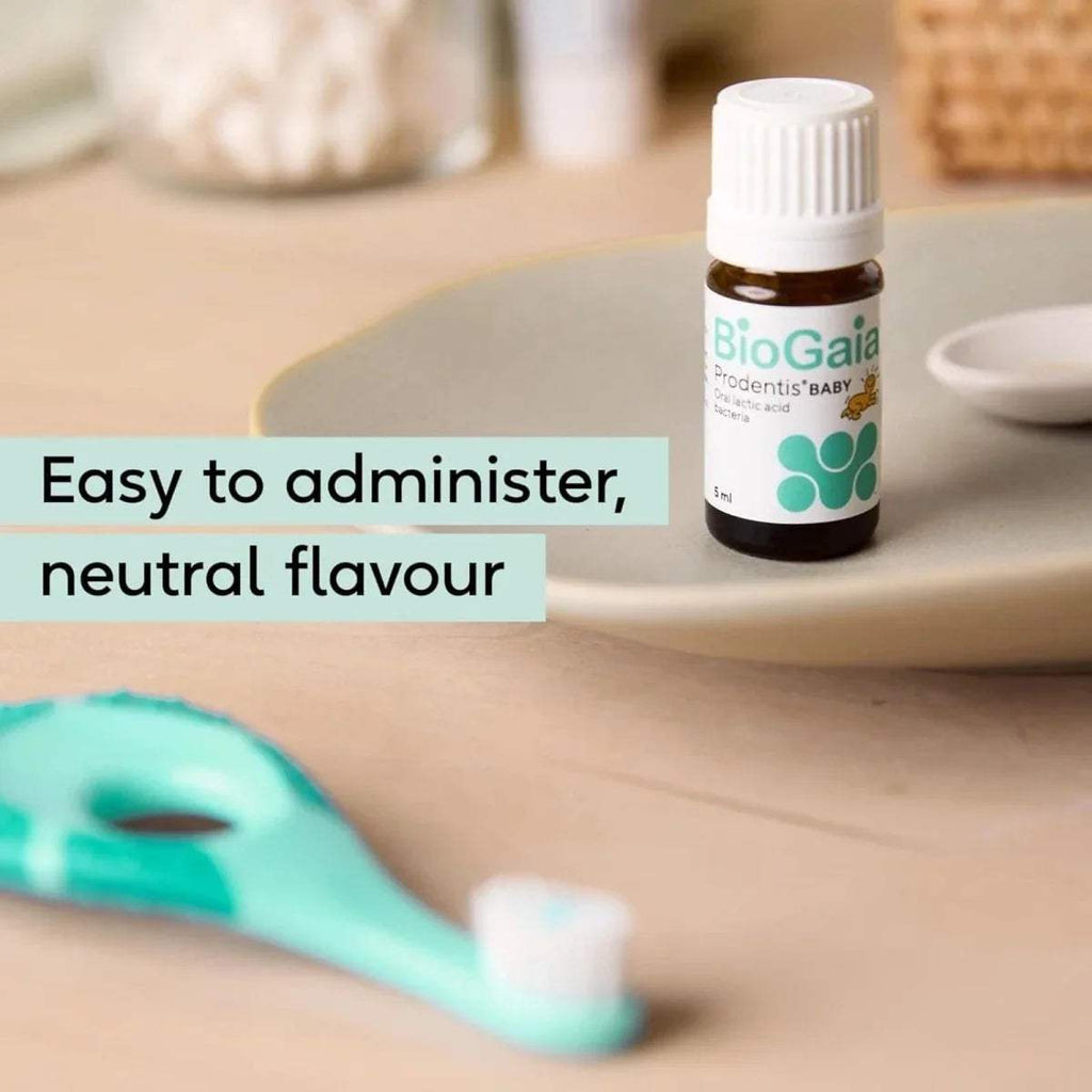 Baby probiotic drops bottle with dropper on countertop
