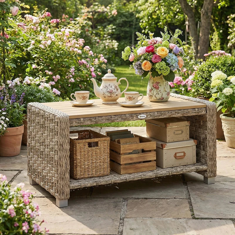 Light brown PE rattan coffee table with slatted top and open storage shelf for items