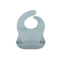 Dusky blue silicone baby bib with adjustable neck tab and crumb catcher pocket