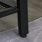 Black steel leg with leveling foot on a rustic TV stand cabinet, beside black mesh shelf.