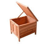 Wooden guinea pig hutch with open hinged lid, interior visible, raised floor and ramp