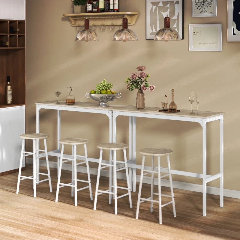 White bar table with two light oak-tone stools in a kitchen dining setup.