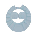 Light blue baby bath cap with two large ear openings and adjustable snap tabs