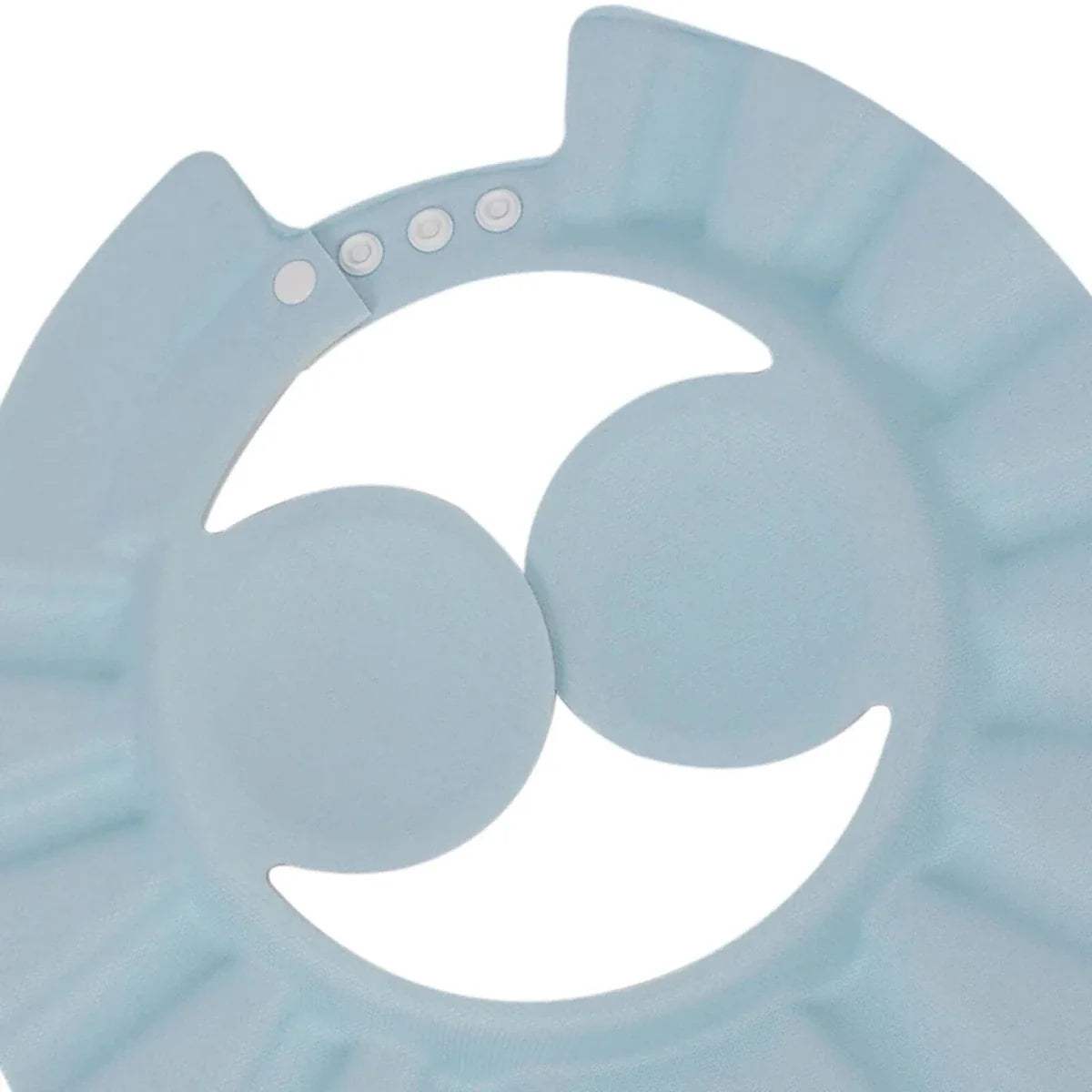 Light blue baby bath cap close-up with ear holes and adjustable snap band