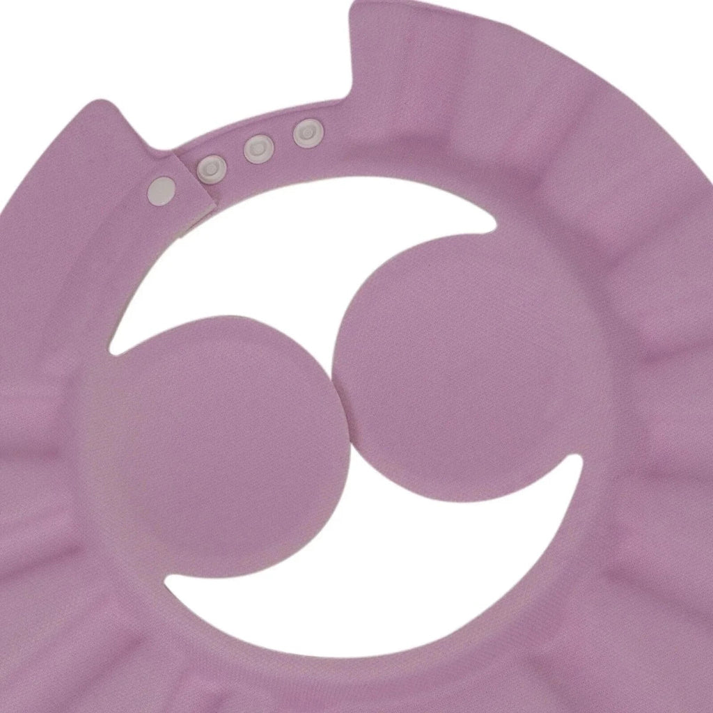 Pink baby bath cap with curved shell and buttoned neck strap