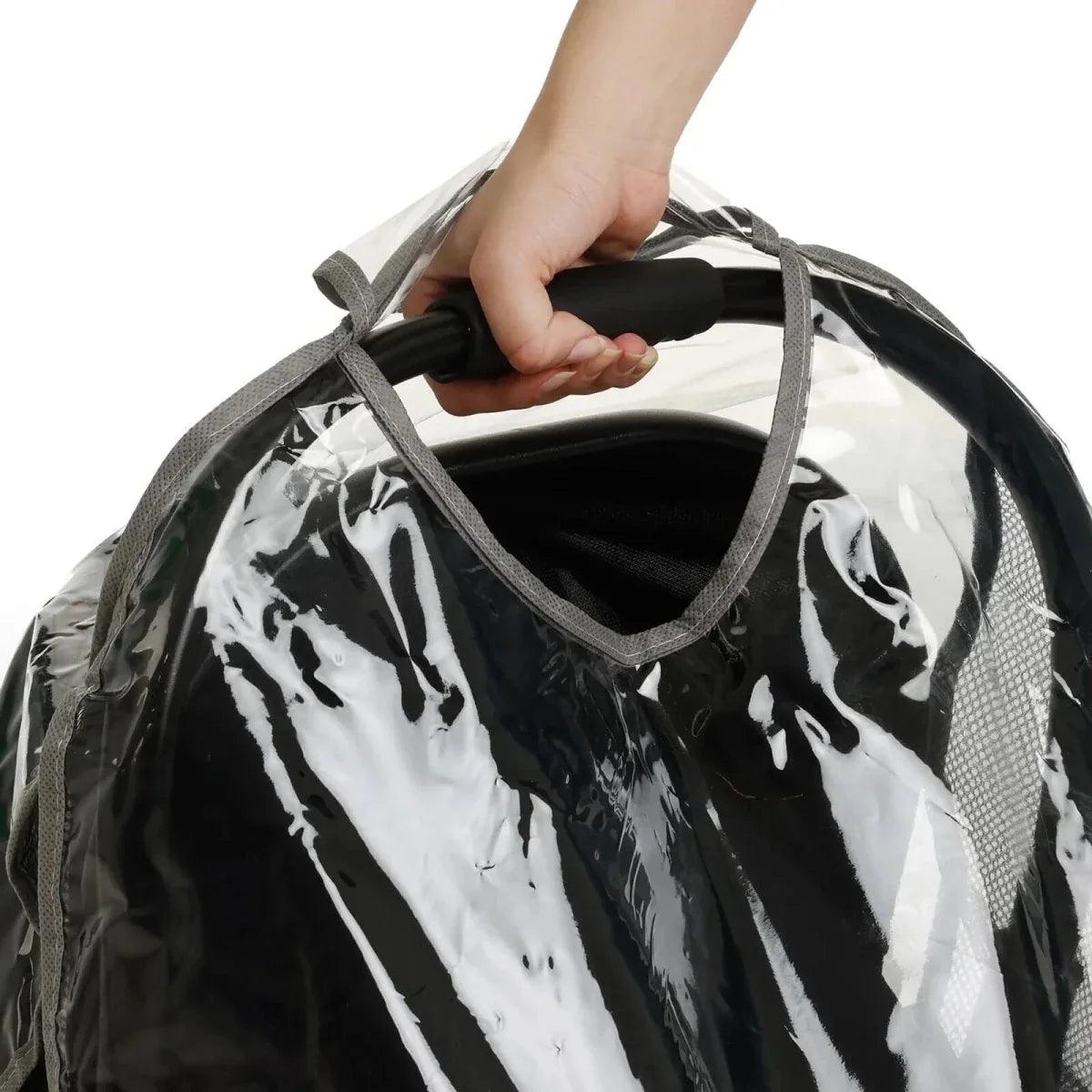 Rain cover with transparent top and gray carrying handle straps