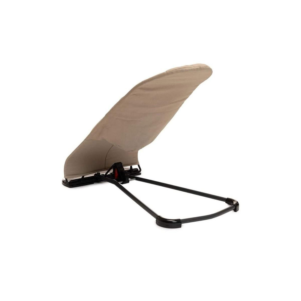 Beige baby bouncer with curved black rocker frame and fabric seat cover