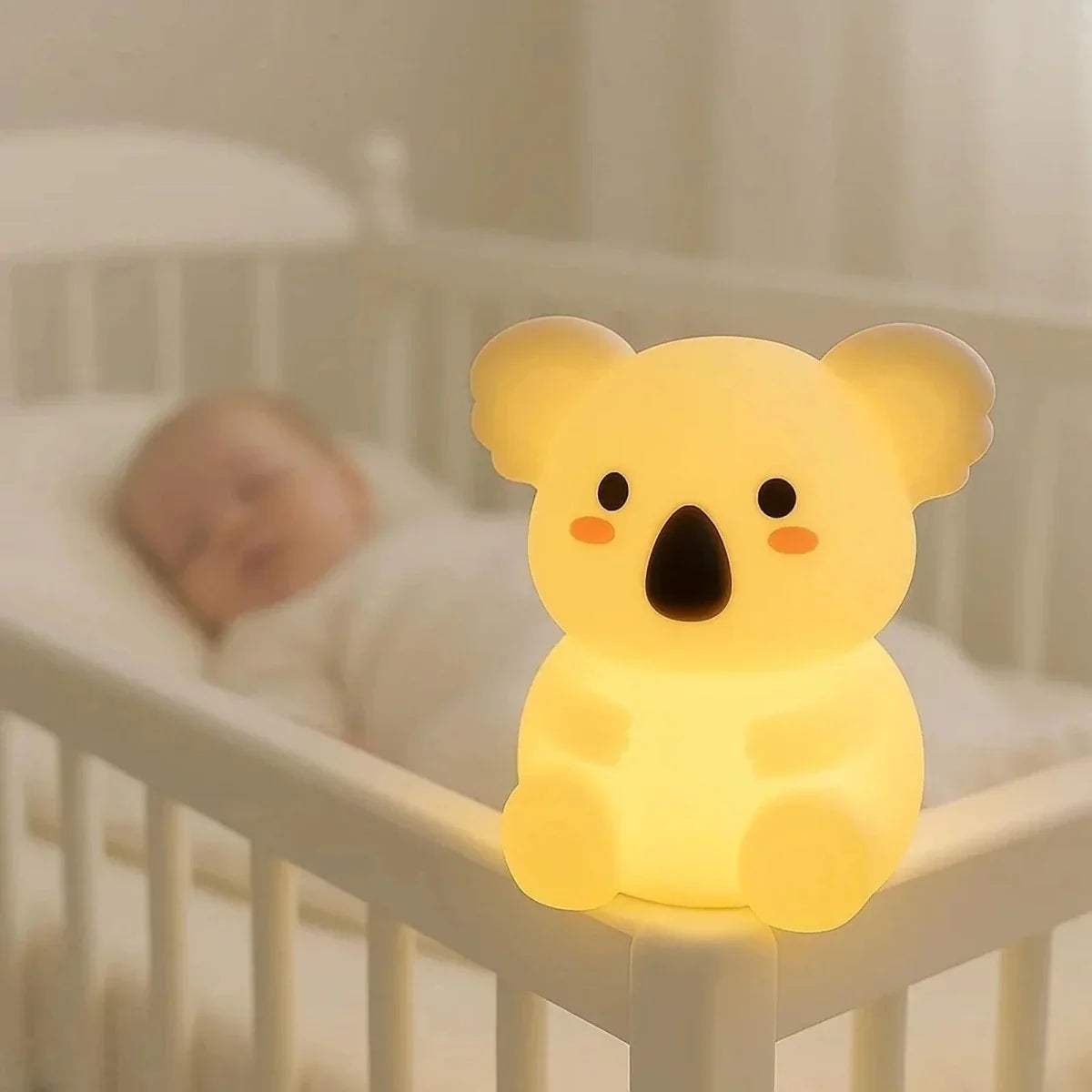 Koala-shaped silicone night light, warm yellow glowing bear design