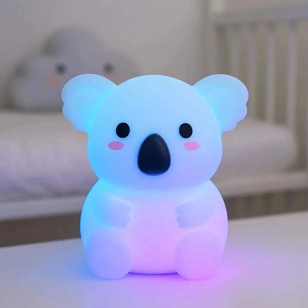 Koala-shaped silicone night light, blue glowing bear figure with black nose and pink cheeks