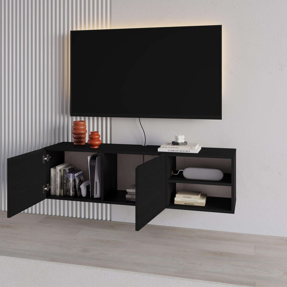 Black wall-mounted TV unit with open doors showing shelves and media storage