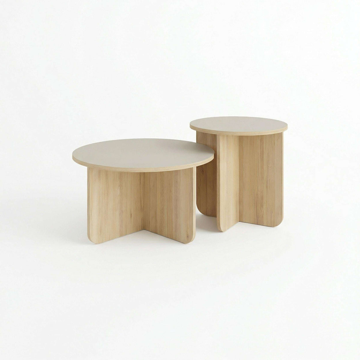 Light oak nesting coffee tables, two-piece set shown from front angle