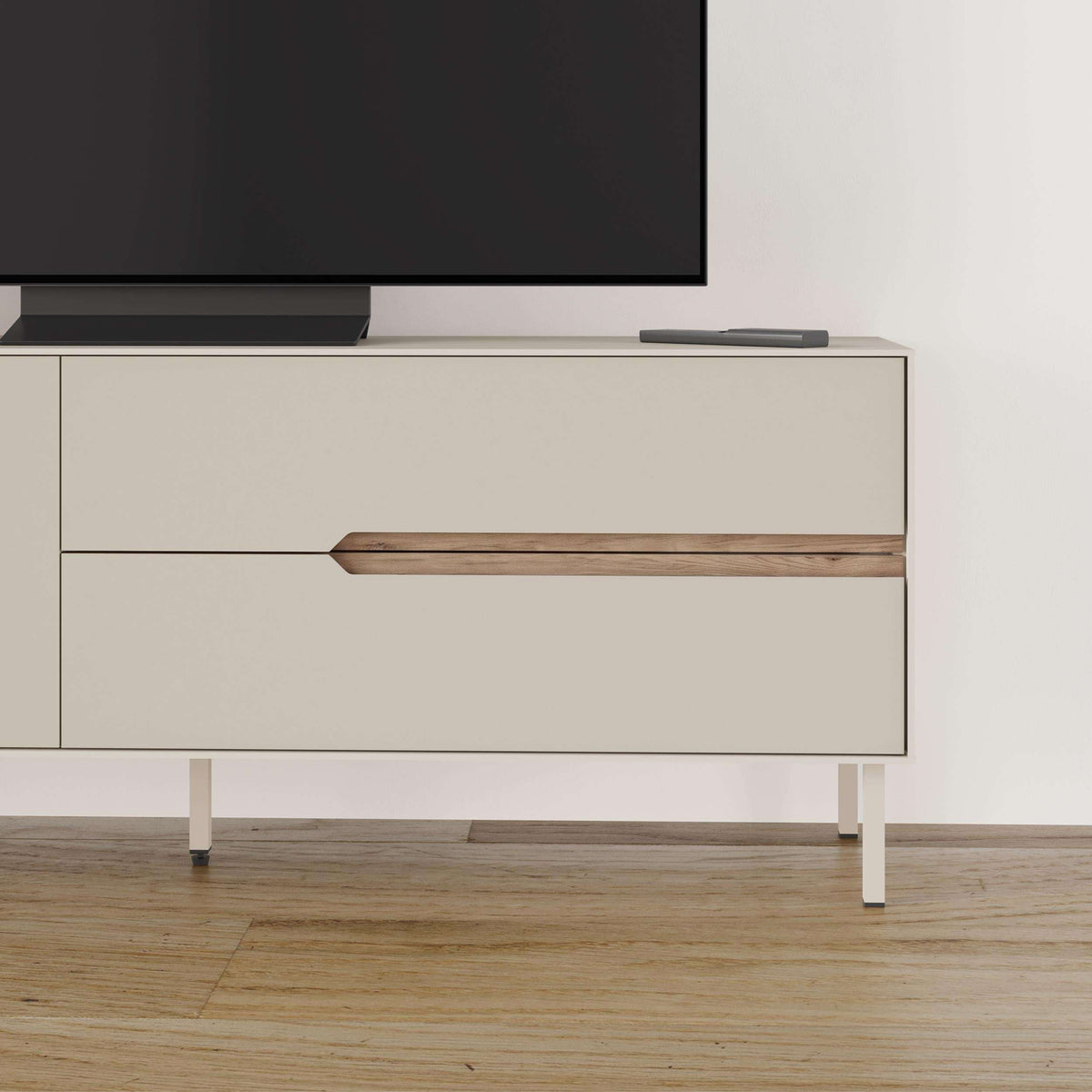 Modern TV console front with light sand doors and drawer, natural oak pull handle