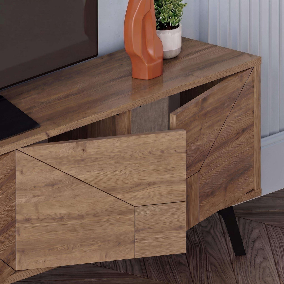 Wood modern TV stand with storage cabinet, close-up of geometric drawer fronts
