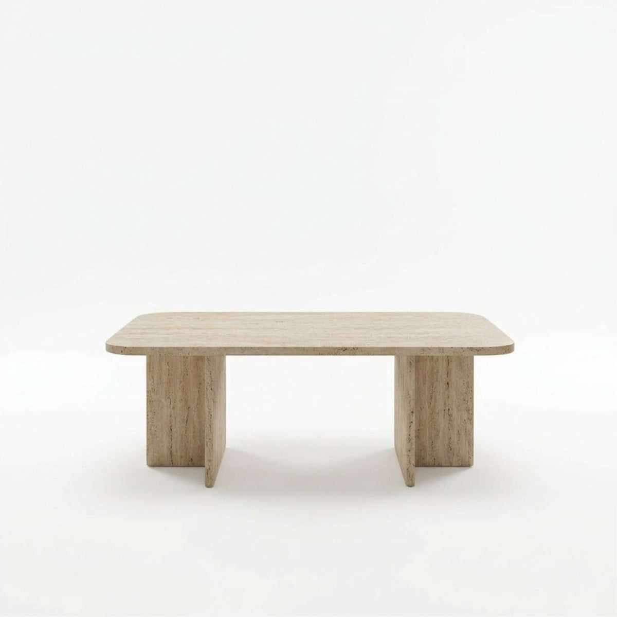 Light stone-look rectangular coffee table with rounded corners and tapered legs