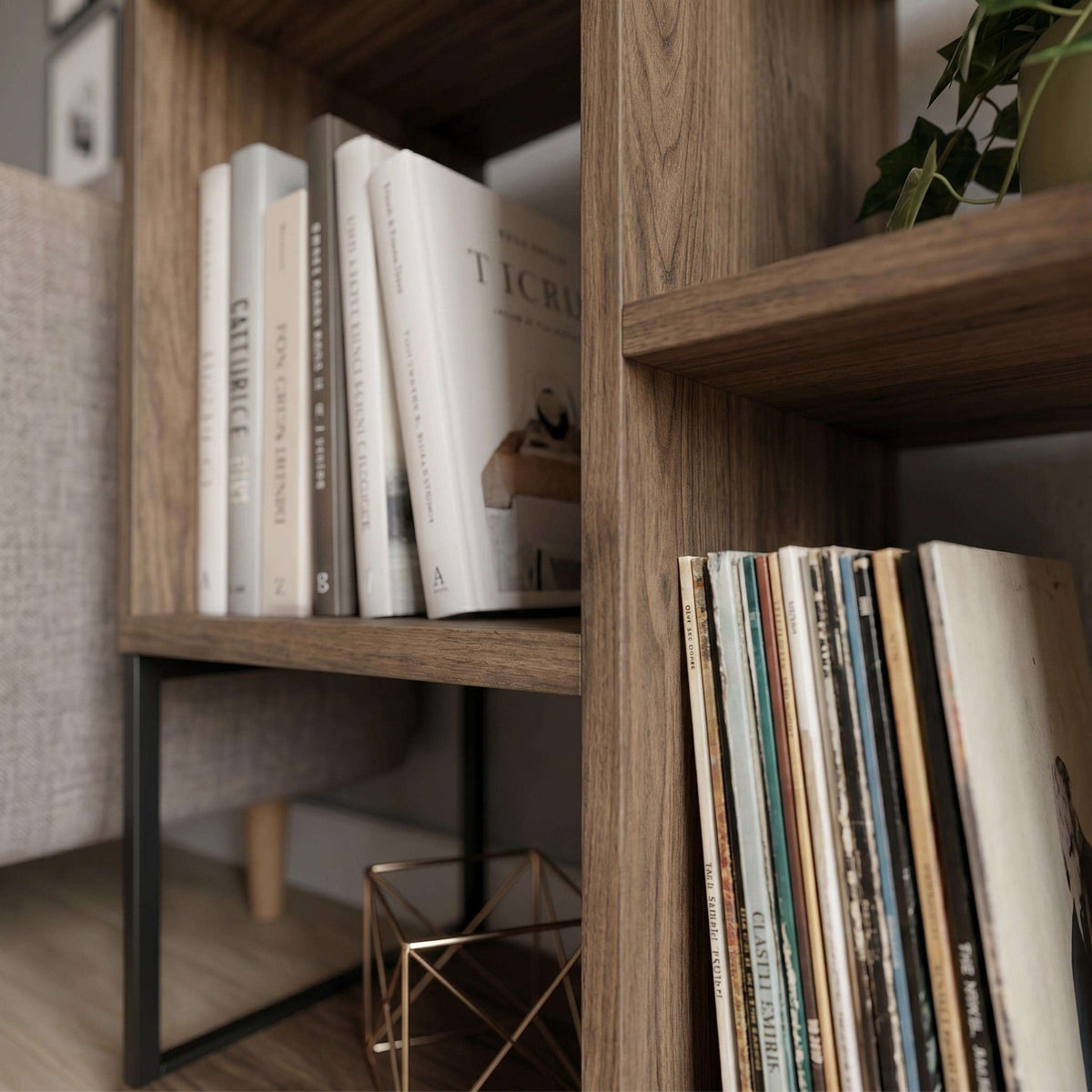 Dark oak bookcase side table with open shelves and black metal frame