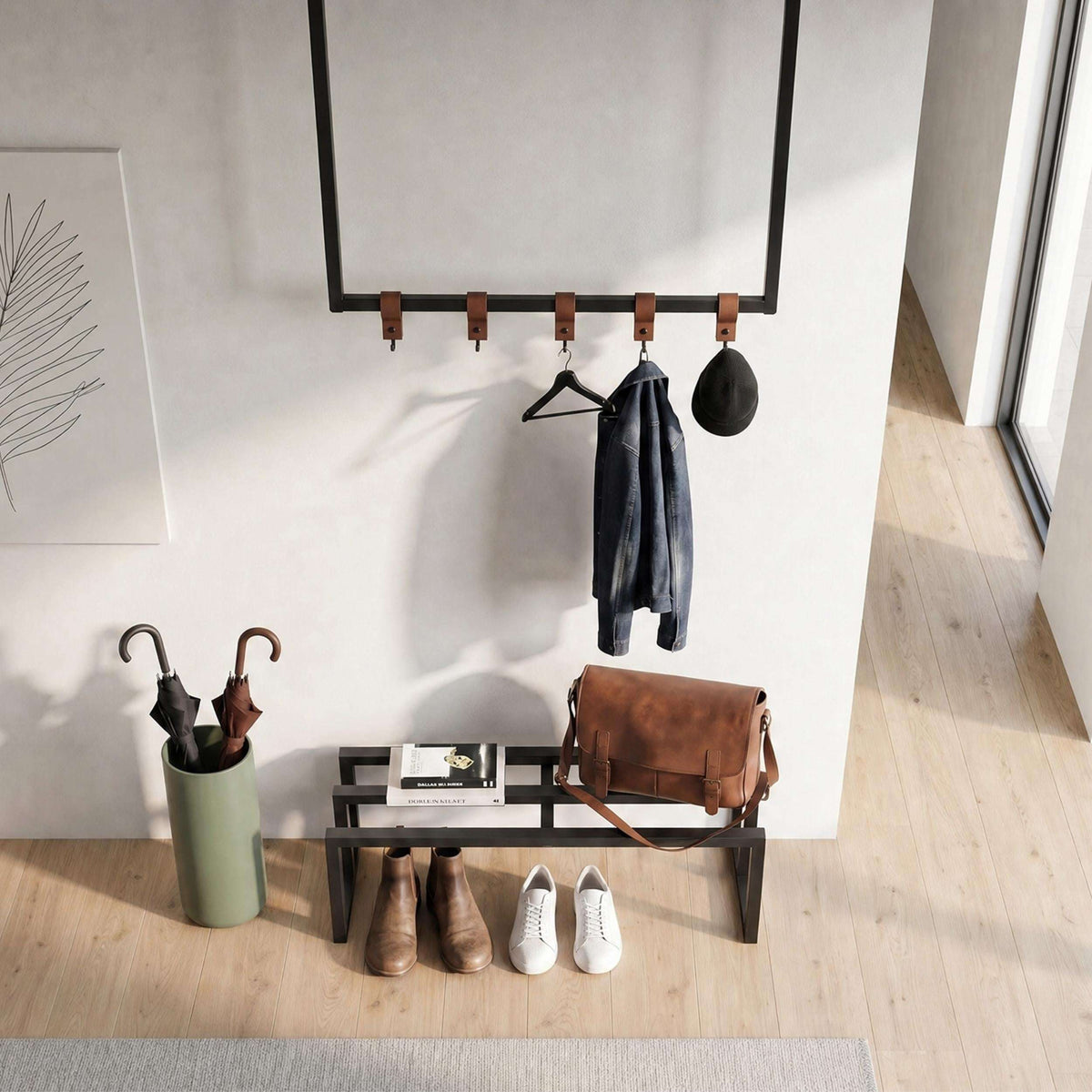 Black wall shoe rack with five hooks and lower shoe shelf