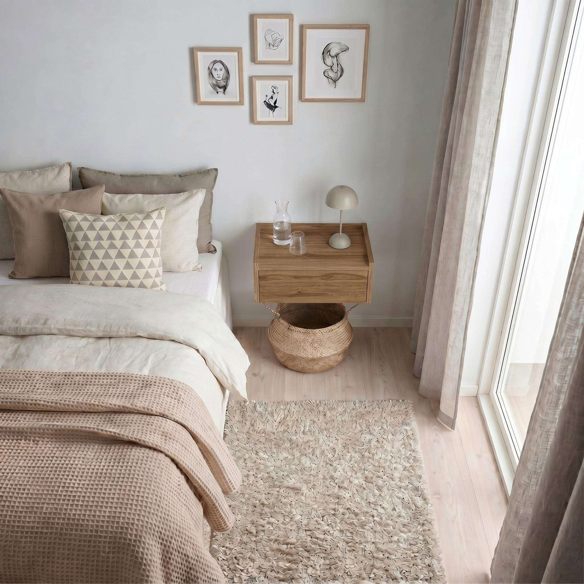 Floating bedside table with drawer and top shelf, light wood, no visible handles