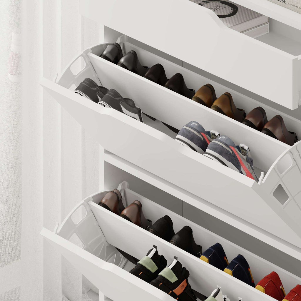 White shoe cabinet with two open shoe compartments, holding multiple pairs