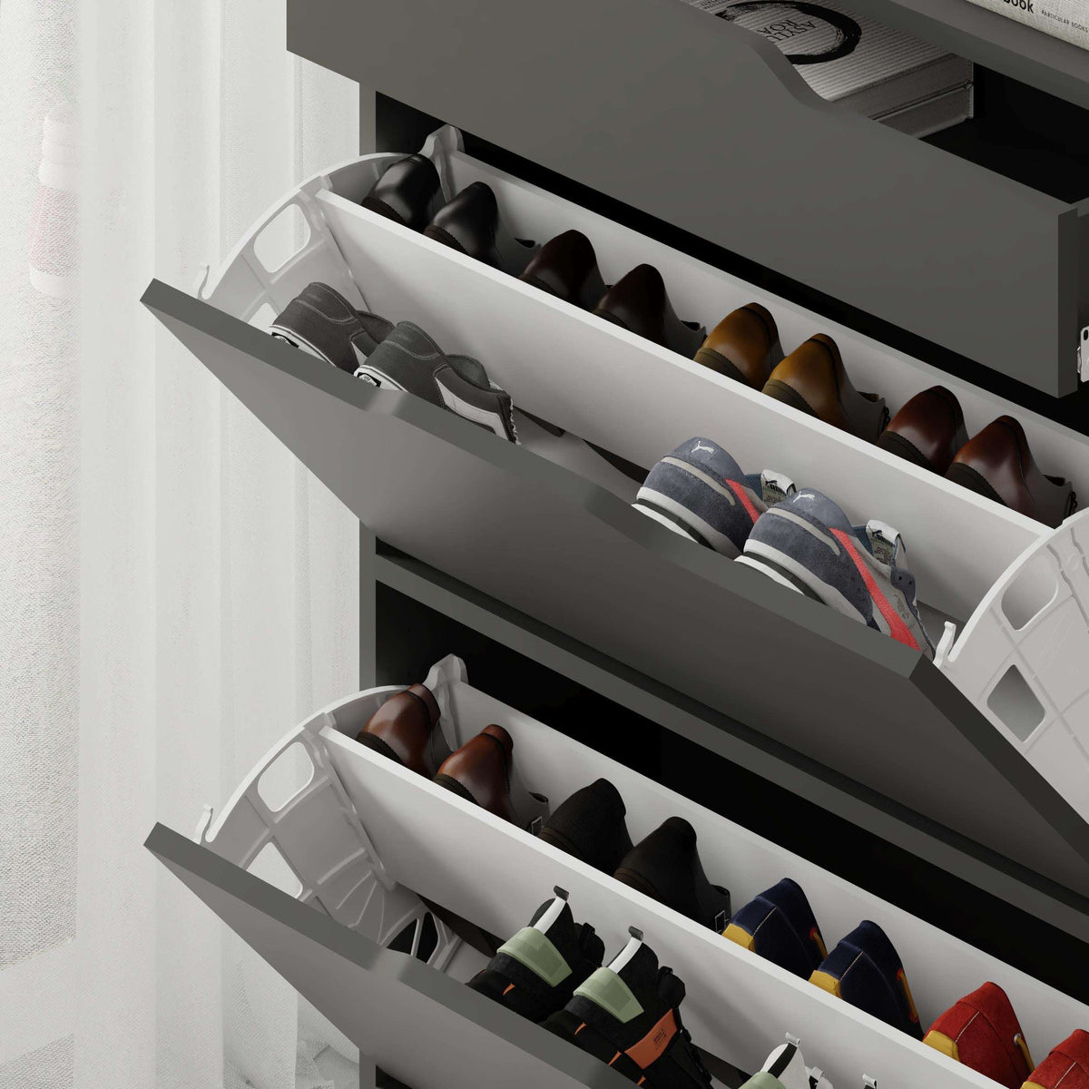 Anthracite shoe cabinet with pull-out shelves displaying shoes in two levels.
