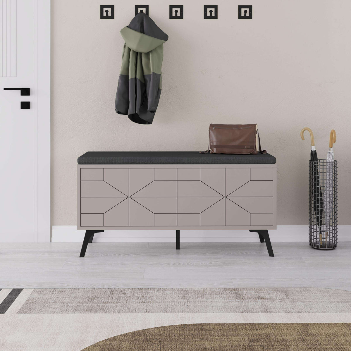 White shoe storage bench with geometric storage doors and dark padded seat