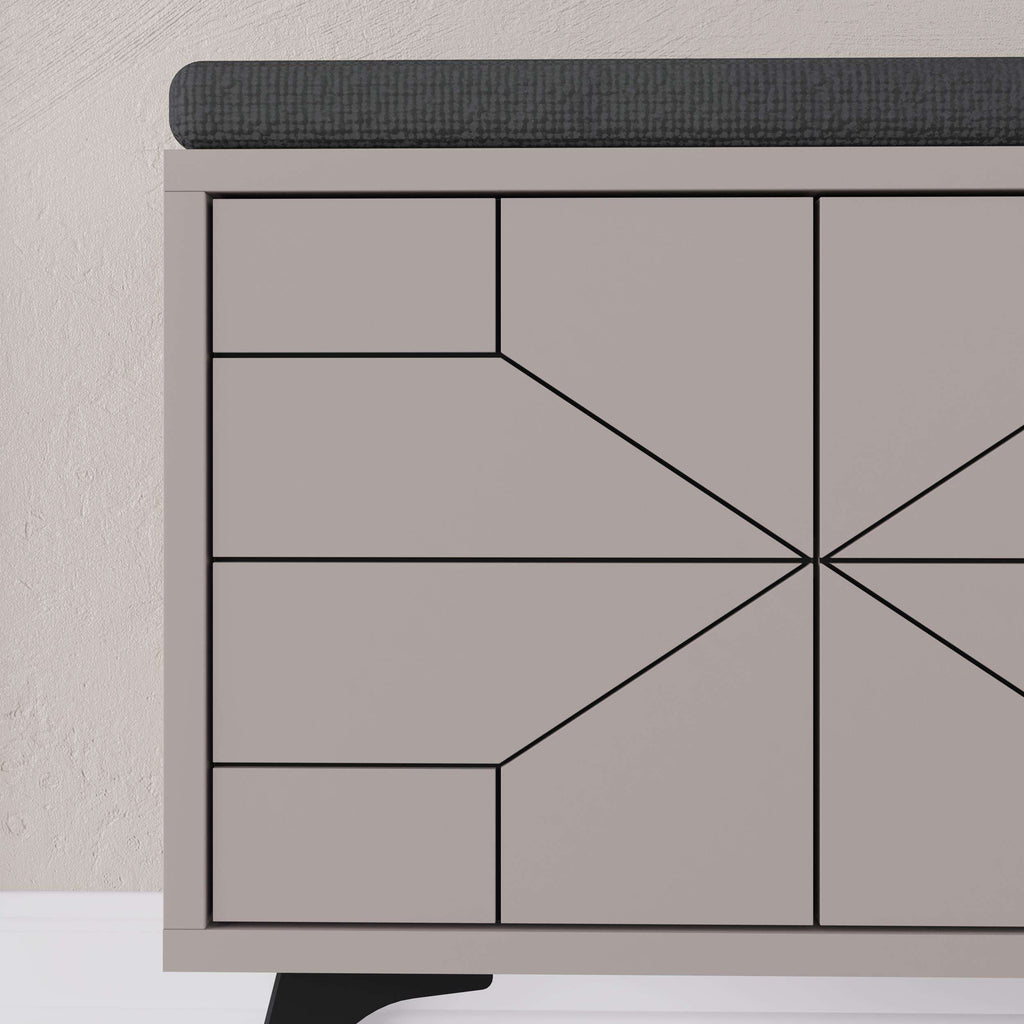 White shoe storage bench cabinet front with geometric panel design and dark top edge