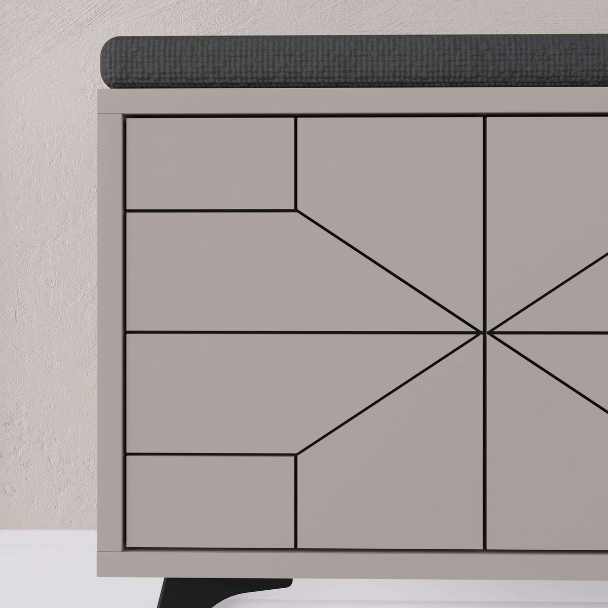 White shoe storage bench cabinet front with geometric panel design and dark top edge