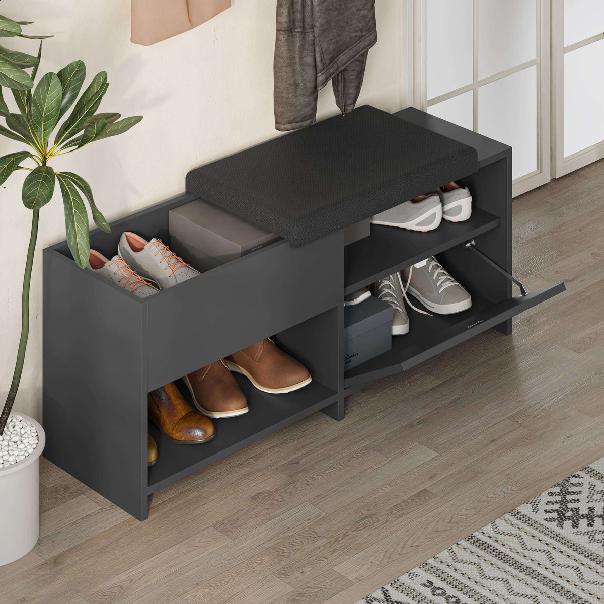 Dark gray shoe bench with padded seat, two-tier open shelves, and front storage drawer.