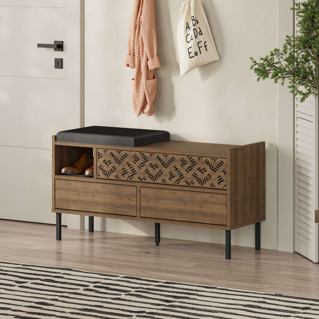 Wood shoe storage bench with black seat cushion and patterned cabinet panels
