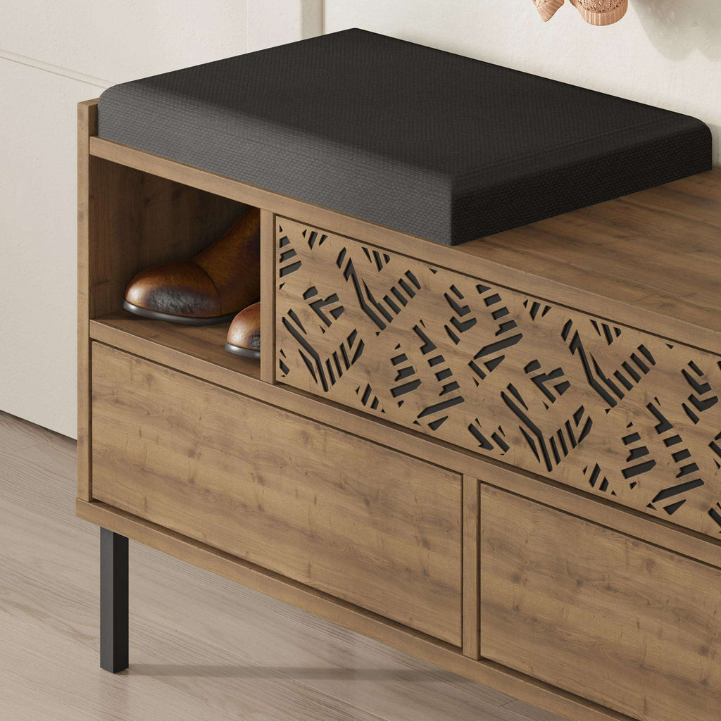Wood shoe storage bench with black seat cushion and patterned side grille
