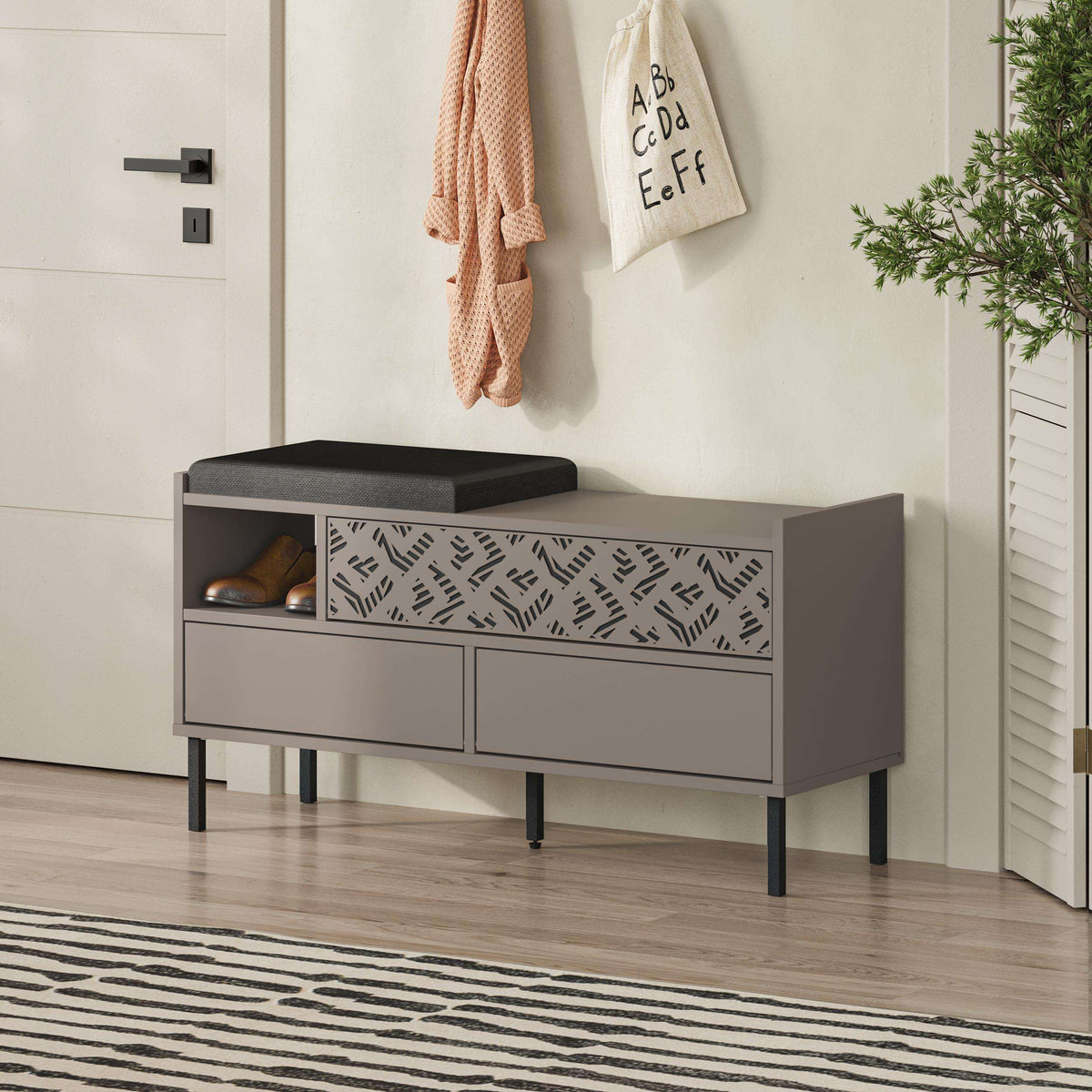 Shoe storage bench with black seat and patterned side panel, open shoe compartment