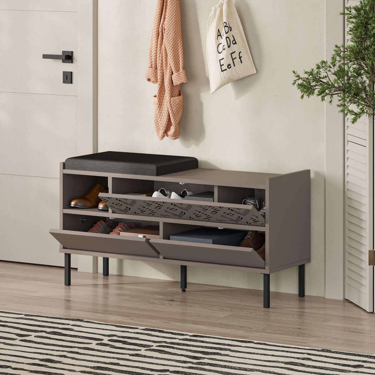 Shoe storage bench with black seat, open compartments, and two front drawers