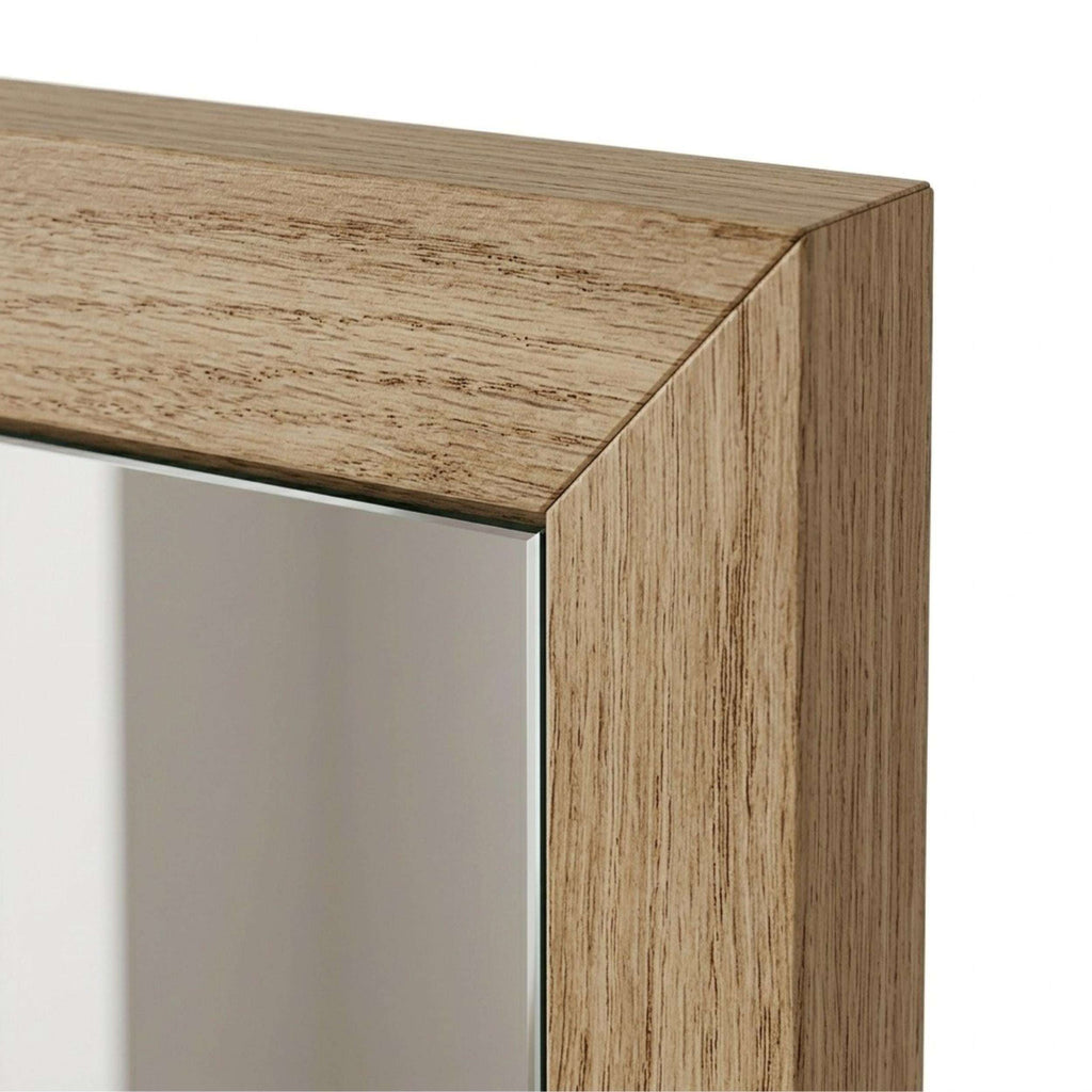 Whiskey oak mirror frame corner detail with smooth wood edge and miter joint