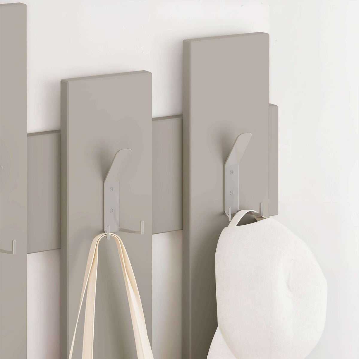 Dark wood coat rack with staggered vertical panels and small coat hooks