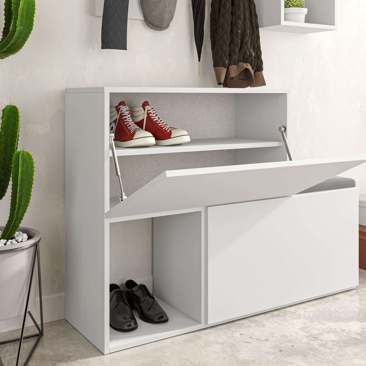 White shoe cabinet close-up with open top shelf and lower cubby shoe storage