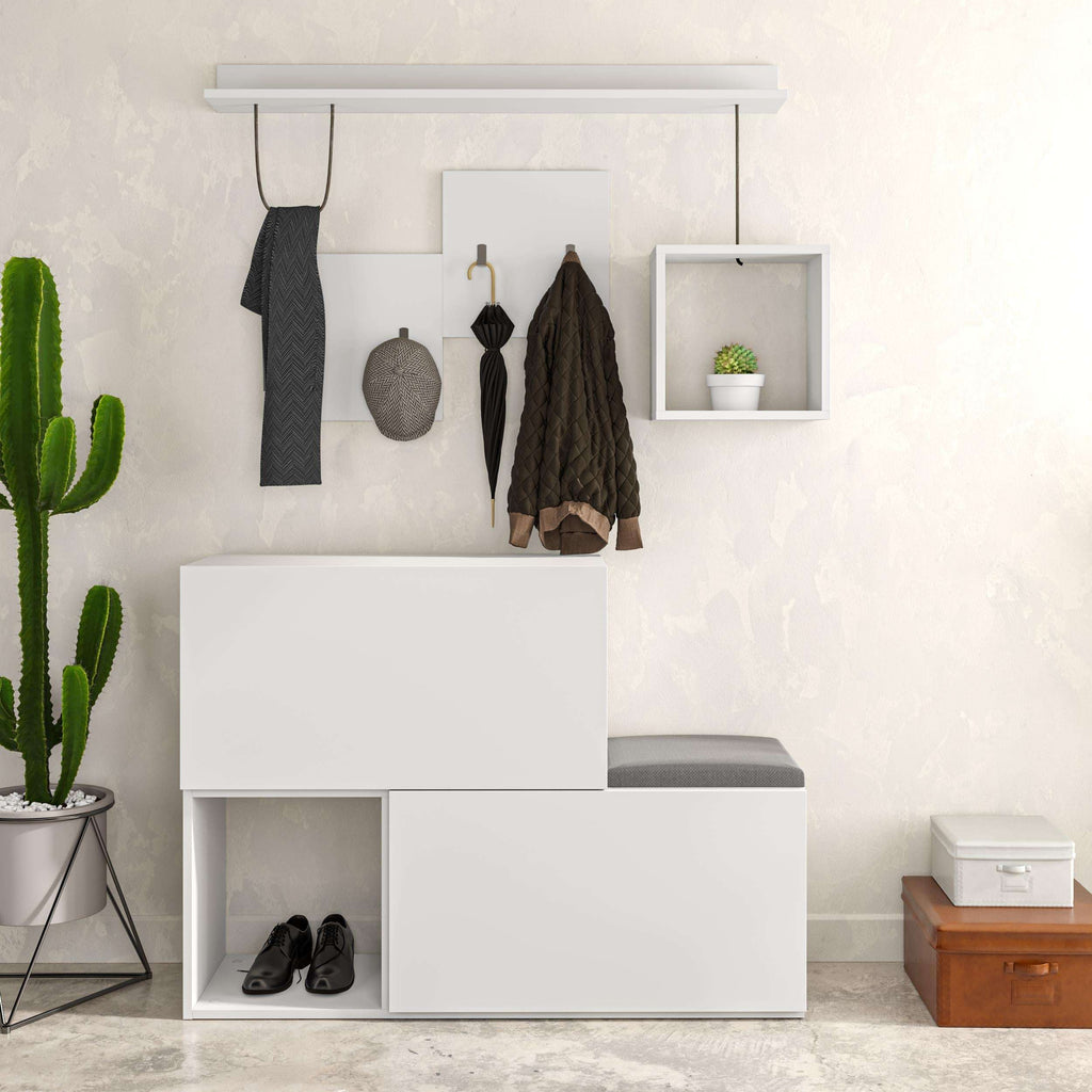White shoe cabinet with wall hanging hooks, open shelves, and flip-down bench seat