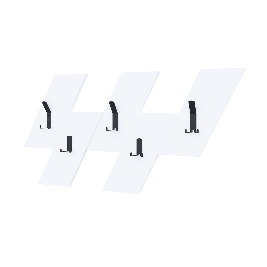 Wall-mounted coat hanger hooks with black pegs on a white backboard, five hooks