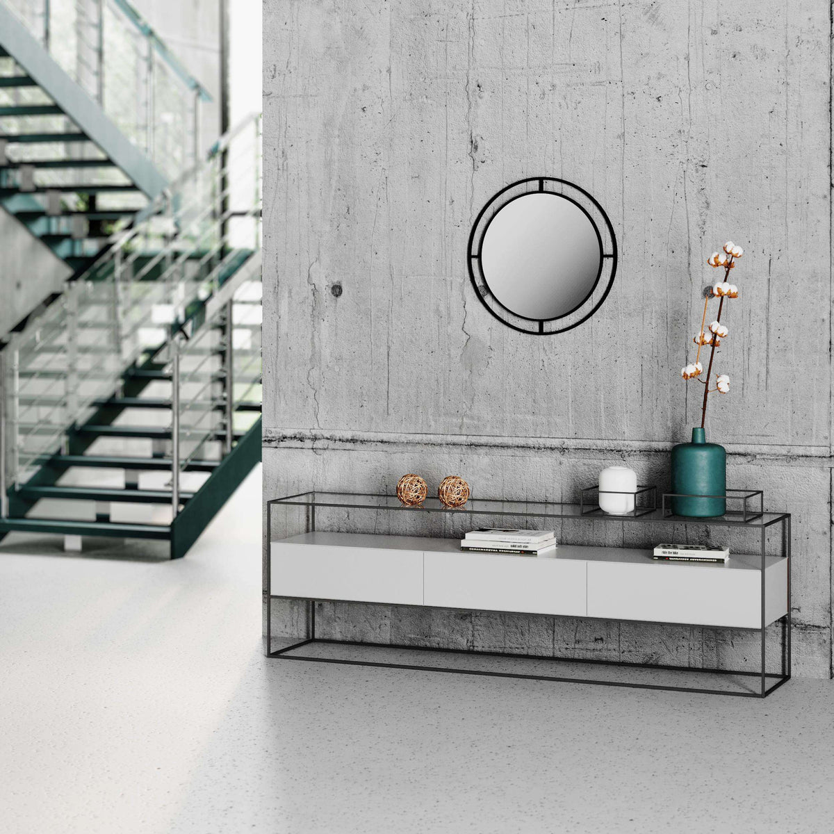 Black round wall mirror with thin double ring frame on concrete wall