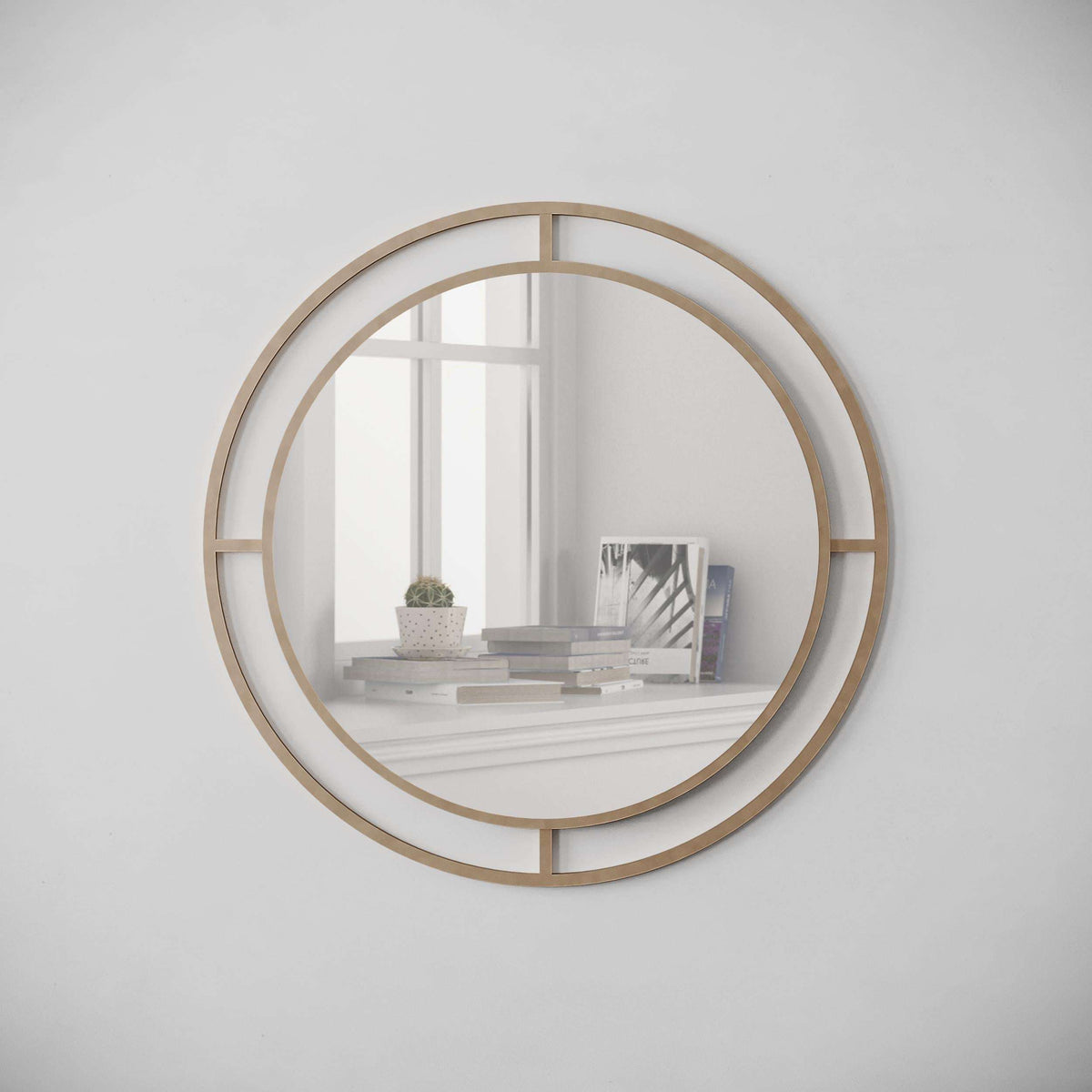 Wall mirror with gold round frame and segmented geometric bars around clear reflective glass.